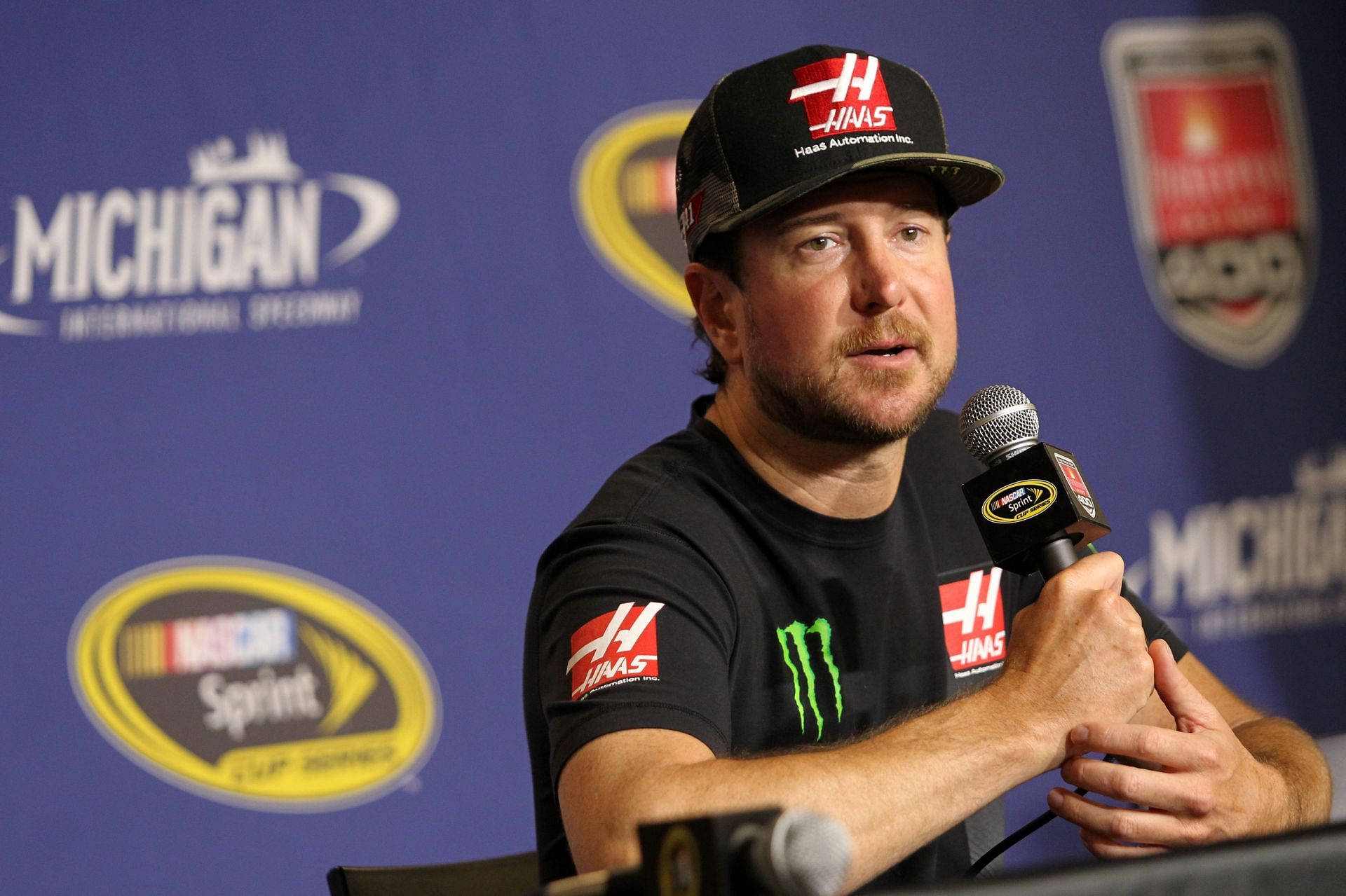 Kurt Busch speaks to the media before the NASCAR Sprint Cup Series FireKeepers Casino 400 at Michigan International Speedway. Source: Getty